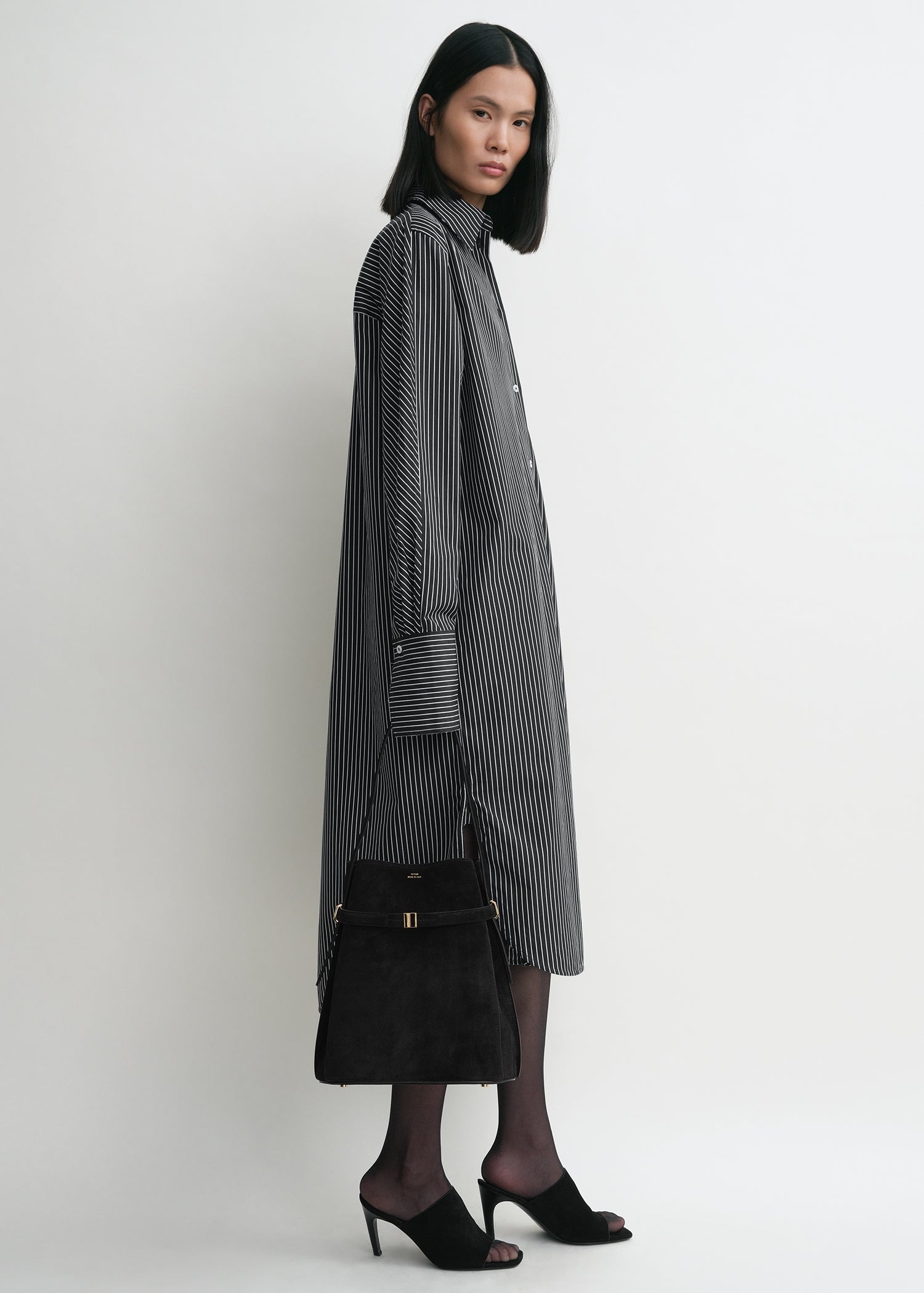 Belted suede bucket bag black