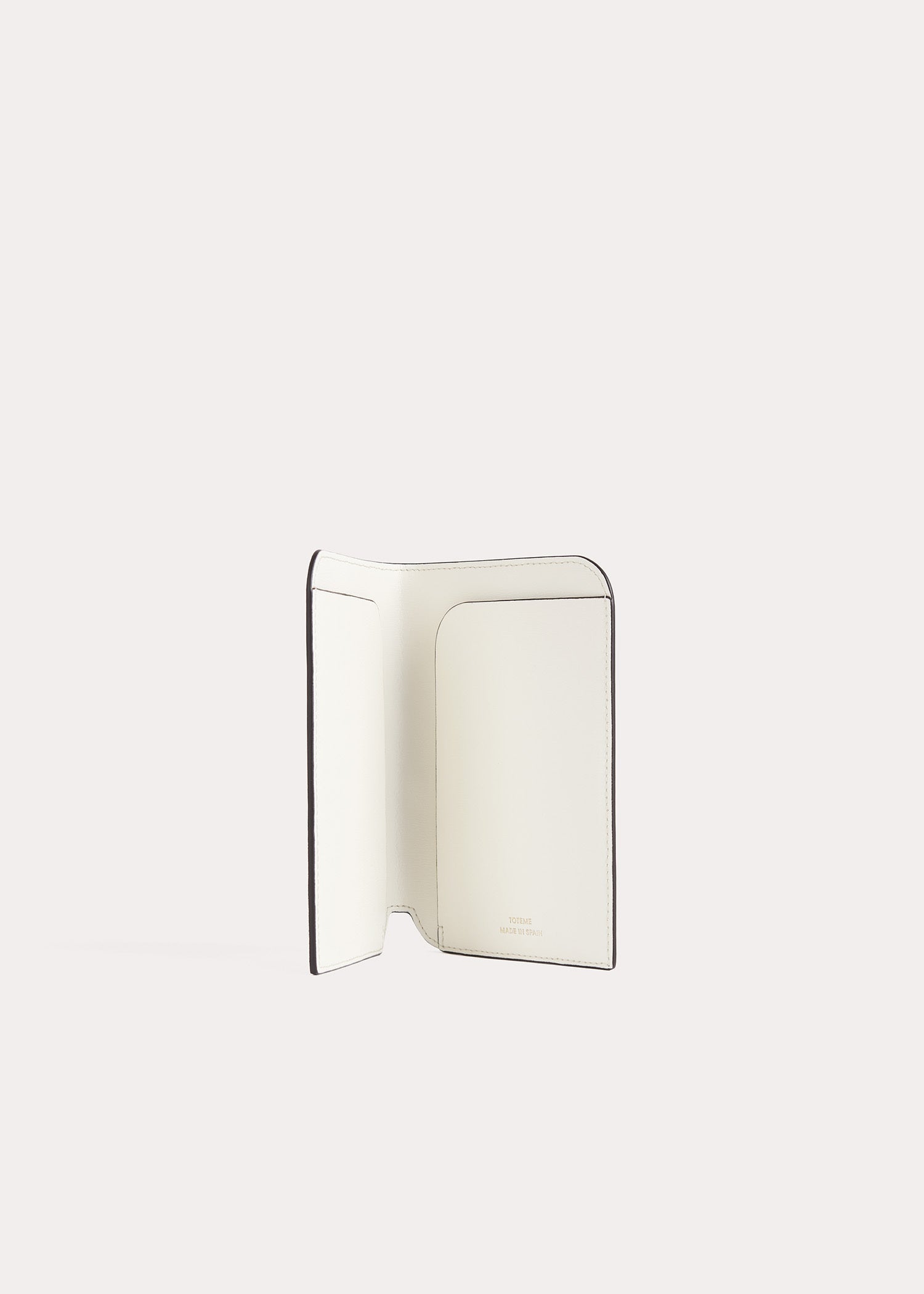 Monogram leather passport holder milk