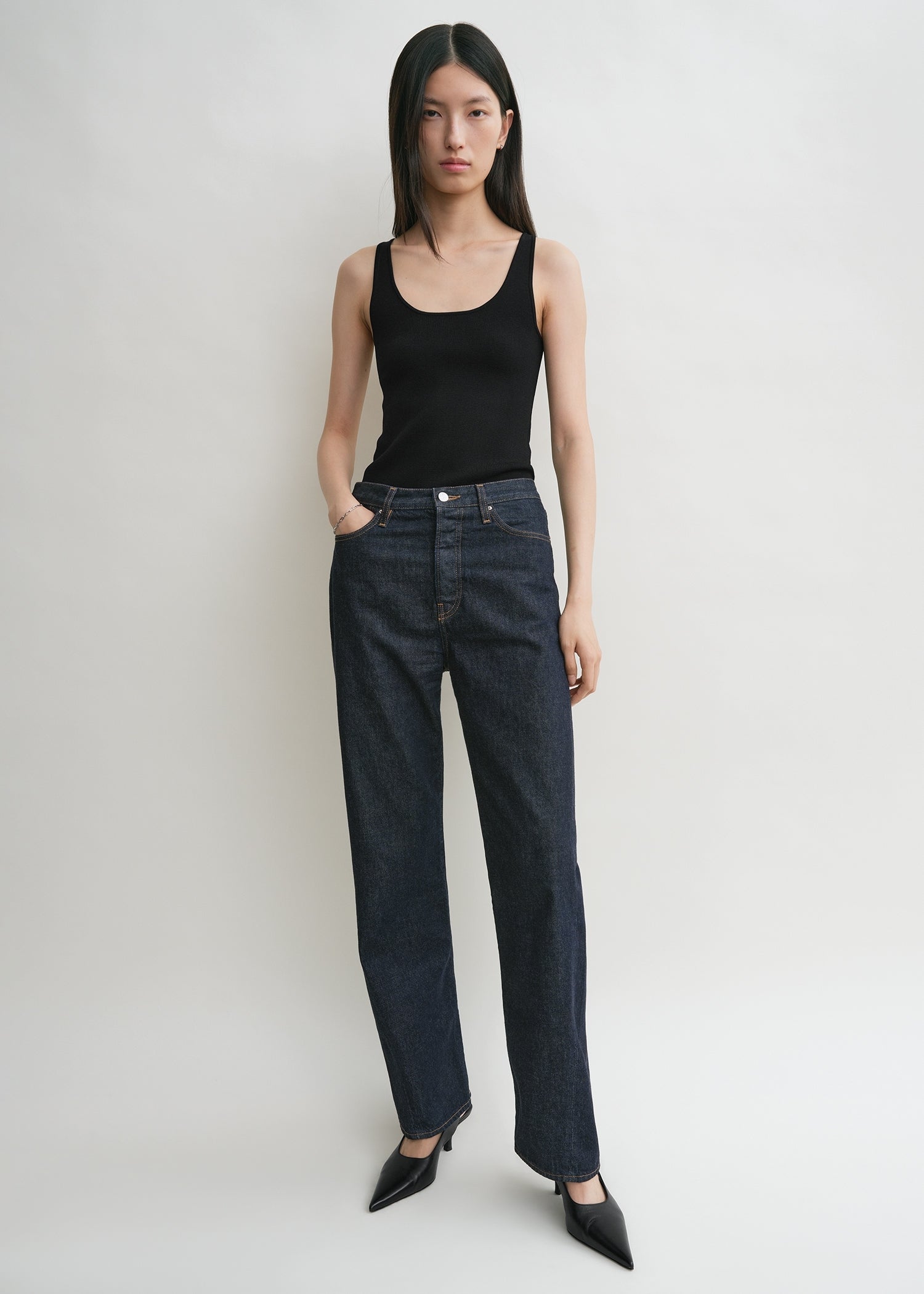Twisted seam denim full length rinsed blue