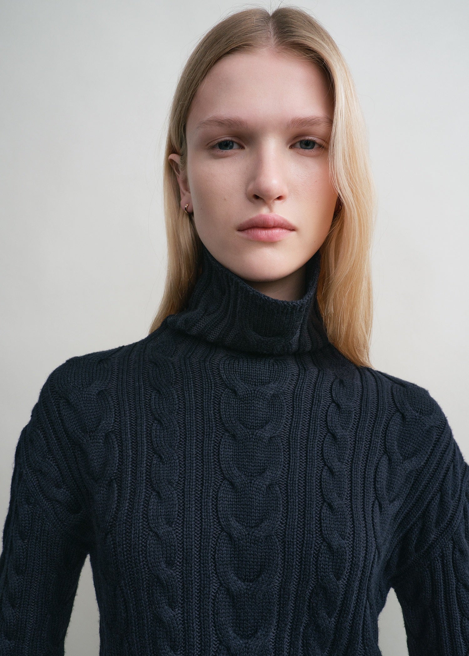 High-neck cable knit navy
