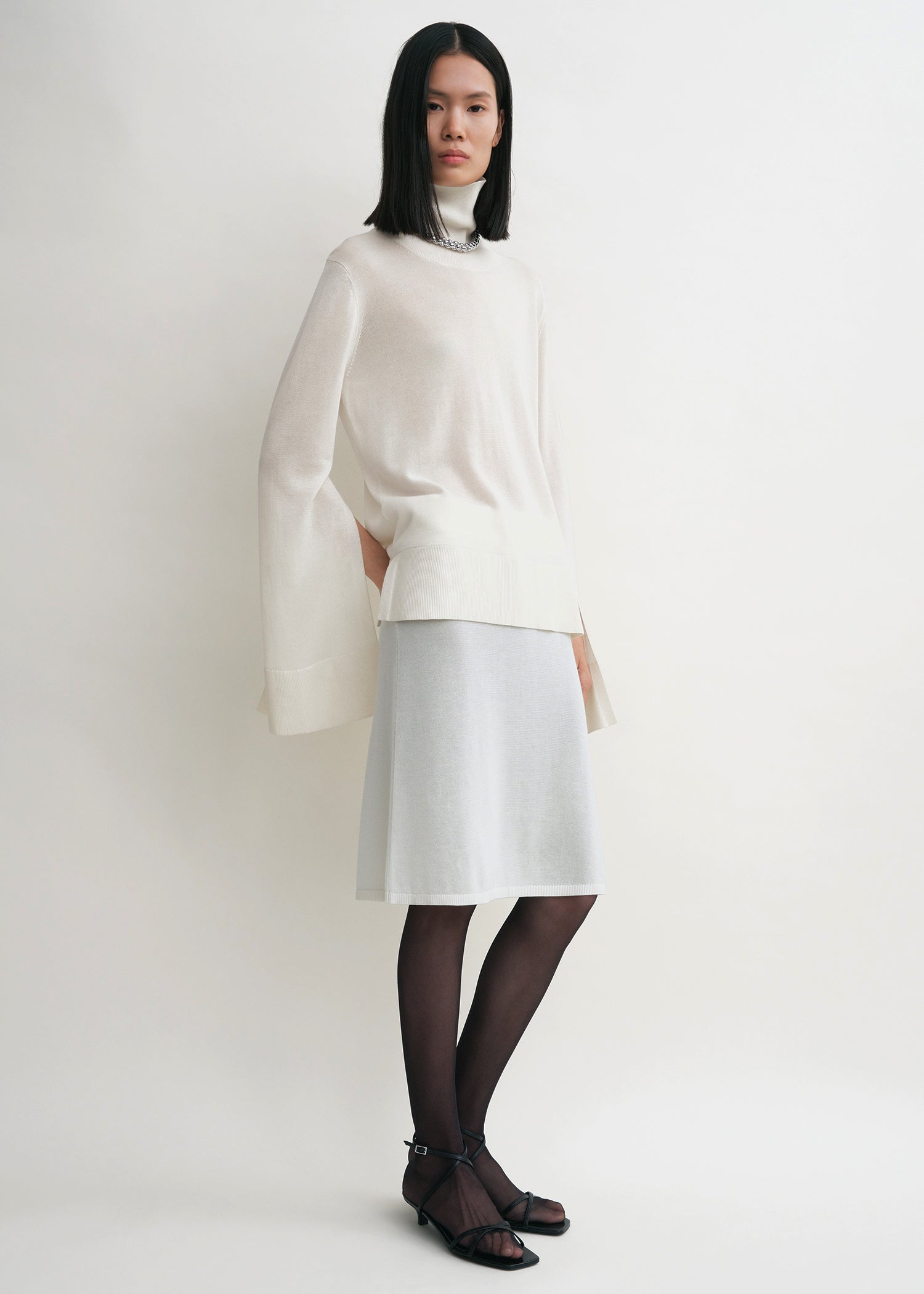 Slit sleeve turtleneck white