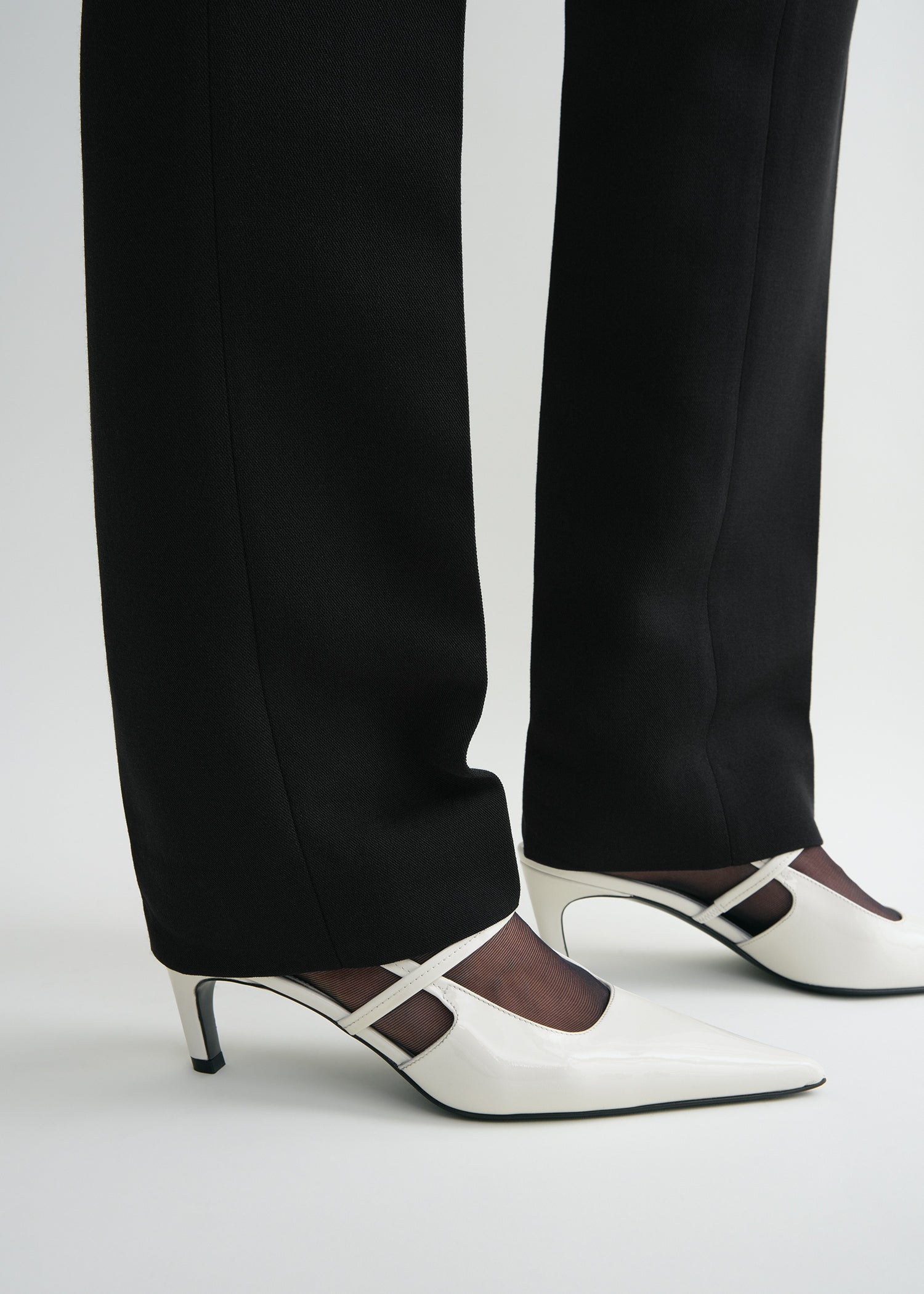 Sharp patent slingbacks off-white