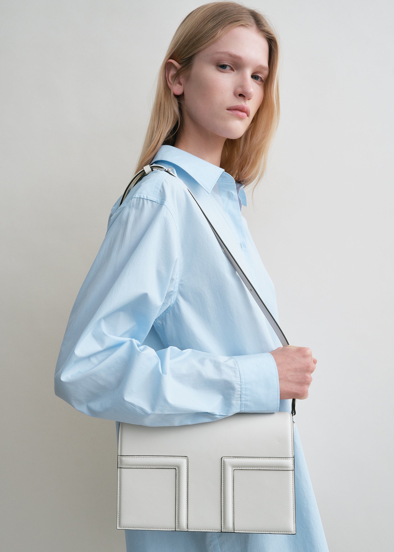 T-Flap leather bag milk