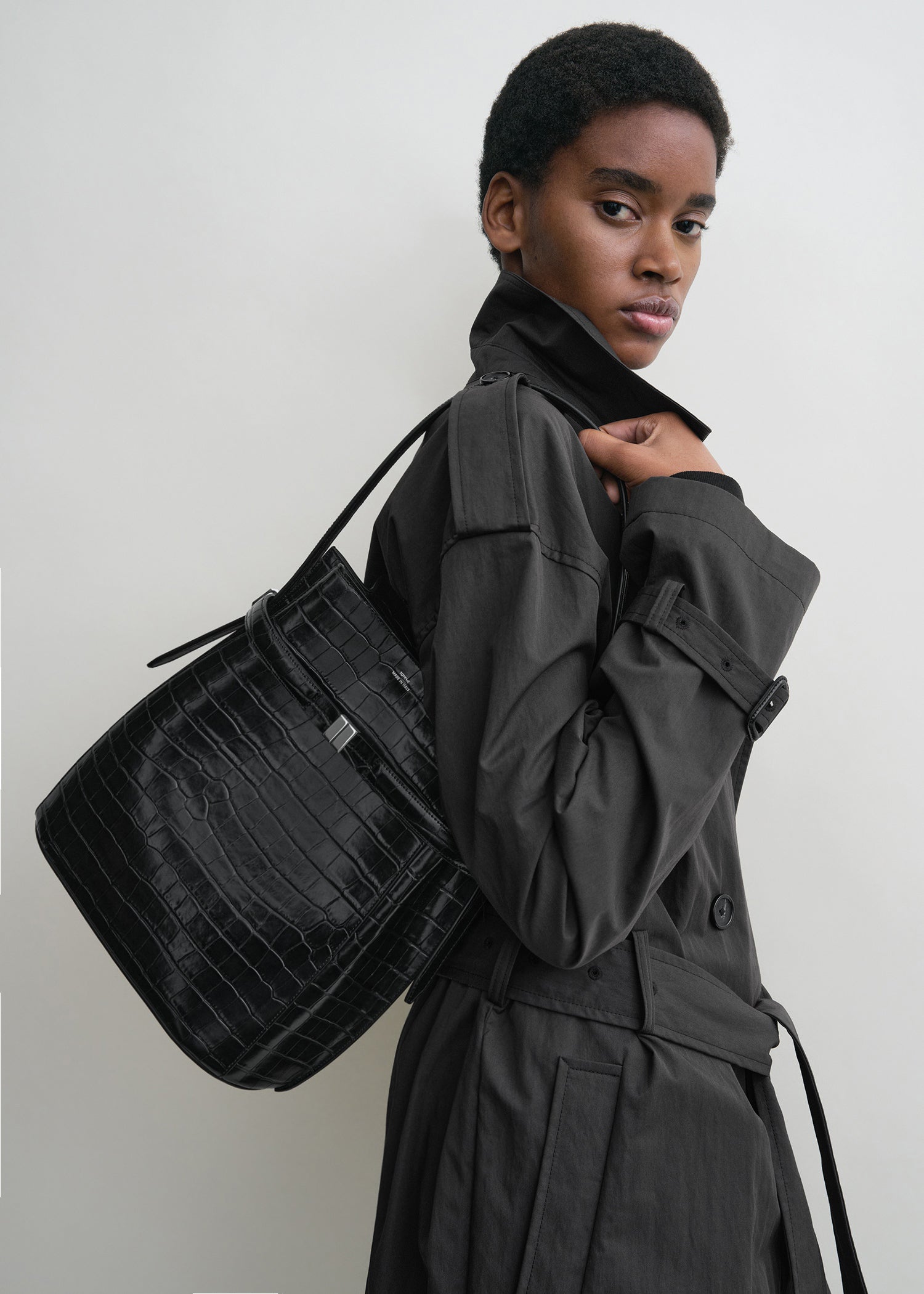 Belted croco-embossed bucket bag black